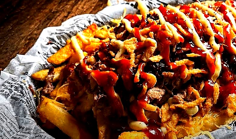 Loaded fries with smoked meat and BBQ drizzle