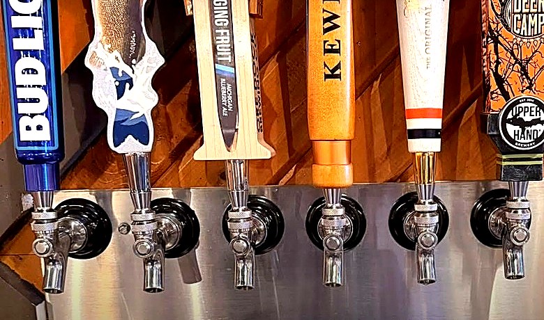 Row of beer taps at the Rusty Rail bar